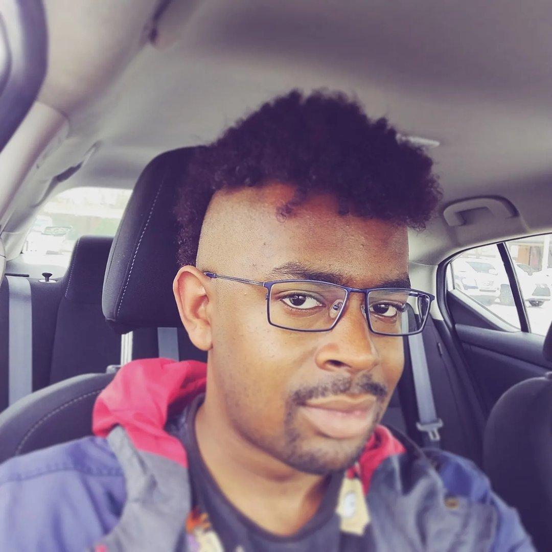 Dr.DevtheGVR's profile picture. A casual image meant to demonstrate that, while he is academically learned, he is also approachable.